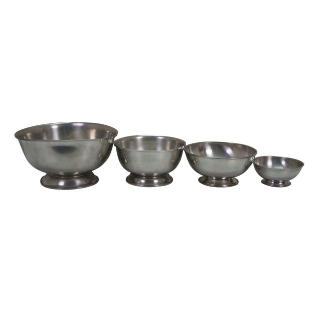 Vintage handcrafted Paul Revere style nesting serving bowls made by Woodbury Pewterers in Connecticut. The bowls are...