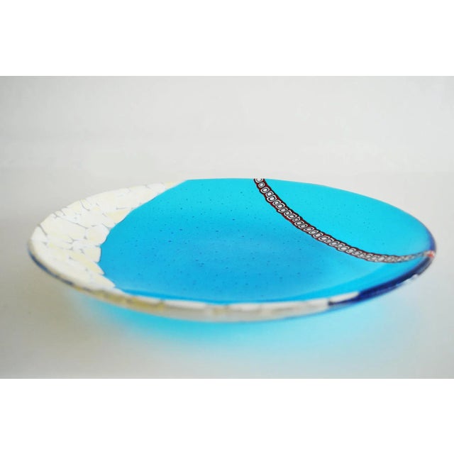 This centerpiece features transparent aquamarine Murano glass, ivory glass and a Venetian Murrine band. Signed by...