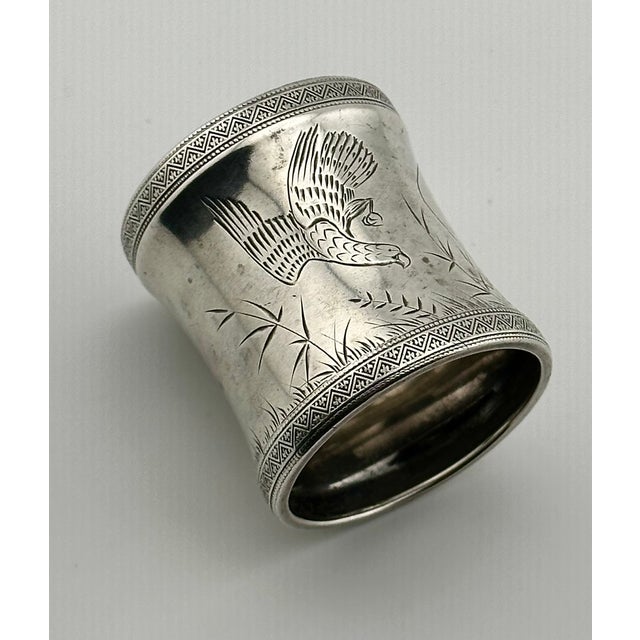 This is an Exceptionally Nice Large Size Antique Sterling Silver Napkin Ring. Circa Approx 1880s. It is Rendered in the...