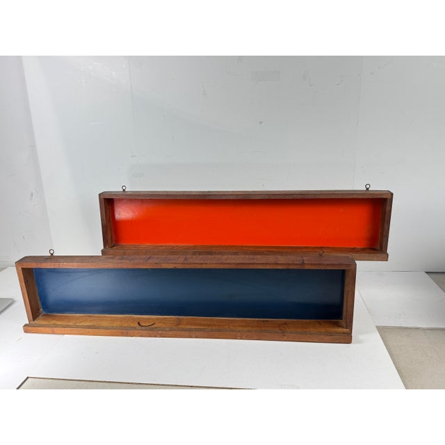 Mid 20th Century MCM 1950s Cabin Modern Architect Pair of MCM Walnut Wall Shelf Spice Rack in Orange+Blue Background Panels For Sale - Image 5 of 7