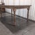 Handmade farmhouse dining table by James + James in solid knotty alder, finished in their light Harvest Wheat stain. Built...