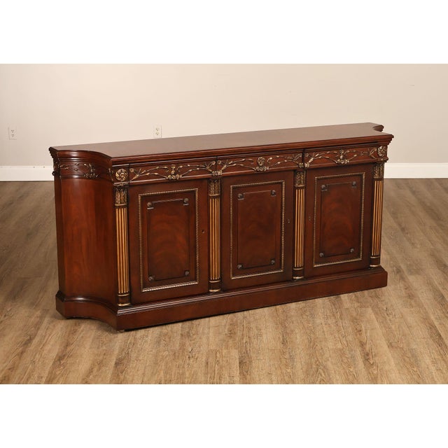 High Quality American Made EJ Victor Mahogany Sideboard. This Piece Features A Long Case Form With Three Cabinet Doors,...