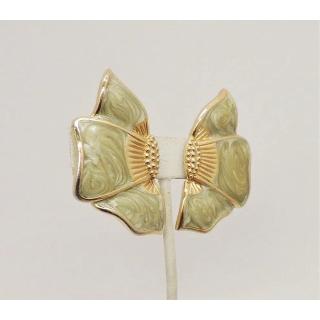 1980s 1984 Vintage Signed Monet Garland Blue Enamel Flower Clip Earrings- 2 Pieces For Sale - Image 5 of 8