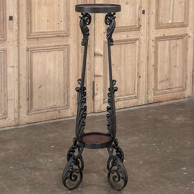 Antique Wrought Iron Two-Tiered Pedestal will make an elegant platform for you to display statuary, vases, urns or objets...