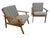 Elevate your living space with this stunning pair of Mid-Century Modern walnut arm chairs, showcasing the timeless clean...