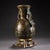 Magnificent archaic-style bronze vase fitted with a pair of sculpted dragon-head handles. The surface is beautifully...