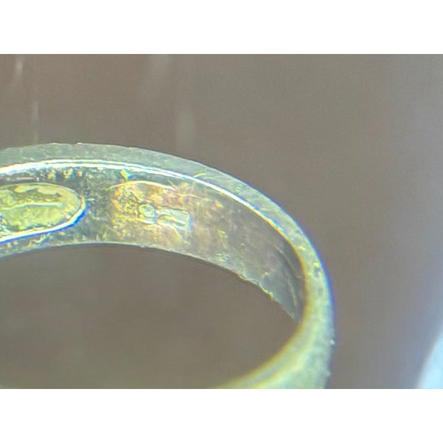 1960s-70s sterling silver cocktail ring w/ greenish-brown faceted rhinestone. Some patina to metal throughout as shown....