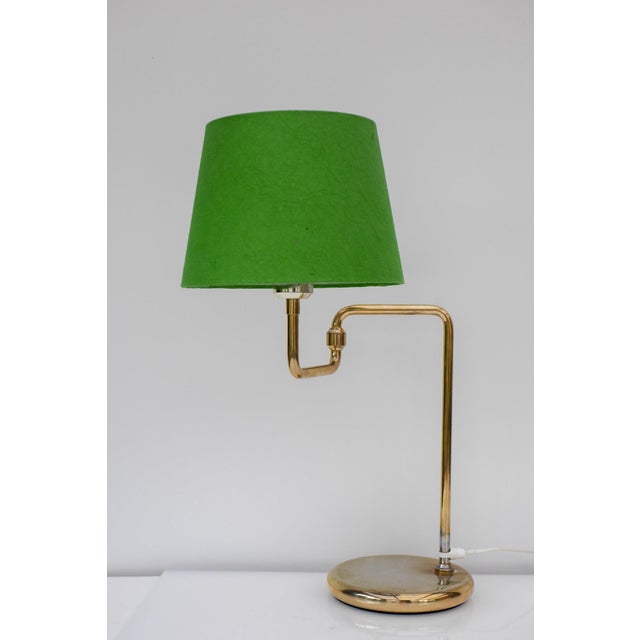 An amazing vintage swedish brass metal swing arm table lamp made by the talented hans-åke johansson in cooperation between...