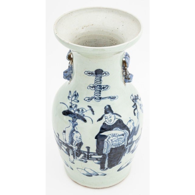 Chinese Blue and White Porcelain Baluster Vase, with two animal form handles and hand-painted figural scenes. 13" H x 7"...