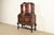 An exceptional Renaissance Revival or Victorian bar cabinet In the manner of R.J. Horner By Rockford Republic Furniture Co...