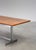 Table designed by Jules Wabbes, Belgium, 1970s. Featuring a rectangular rosewood veneer top, resting on a geometric,...