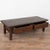 This rustic dark chestnut coffee table features two drawers with iron pulls. The extensive wear and distress give this...