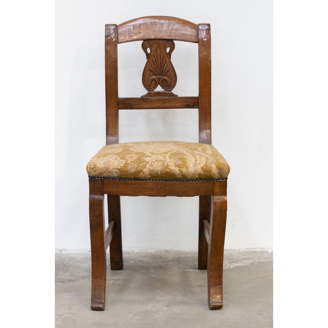 6 beautiful carlo x chairs from the mid-19th century in solid walnut in the backrest there is a finely carved central...