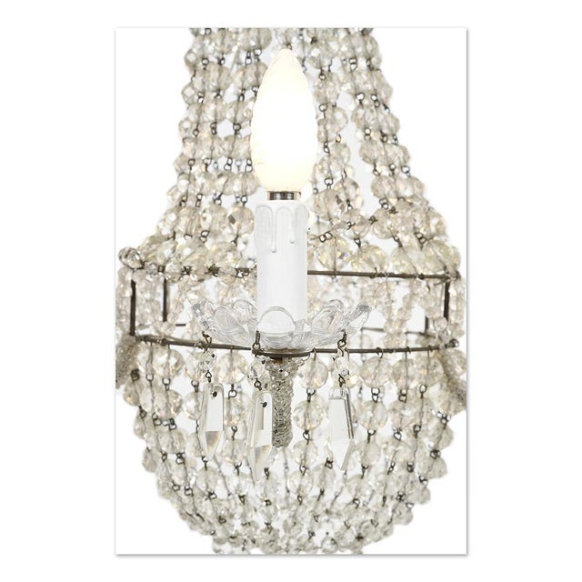 Crystal chandelier with six arms of crystal light. This piece is designed in the style of the selected designer and/or...