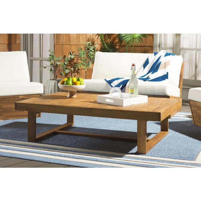 Introducing our Duncan Outdoor Coffee Table, the centerpiece that completes the perfect outdoor getaway. Fashioned in the...