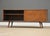 A mid century modern solid maple sideboard, credenza designed by Paul McCobb for Winchendon‘s Planner Group. Two doors and...