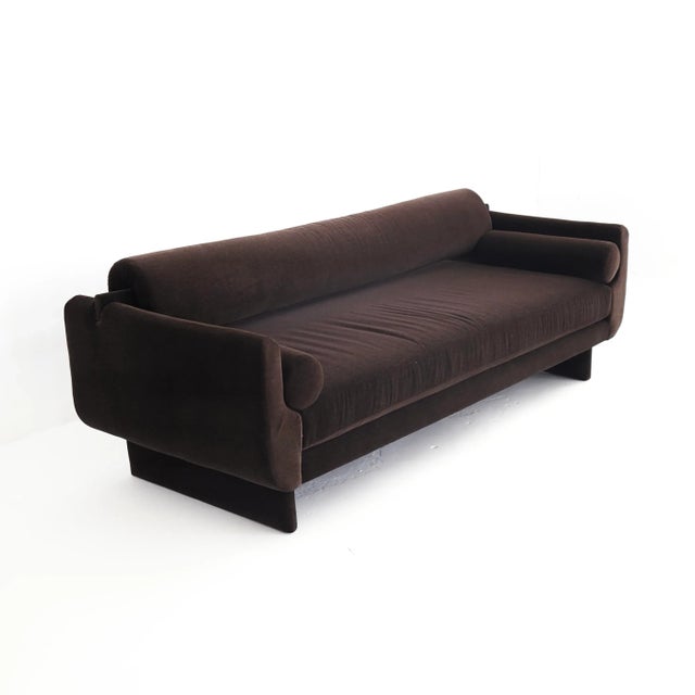 Vintage, signed - excellent restored condition. This piece has been fully reupholstered in a 100% alpaca fabric