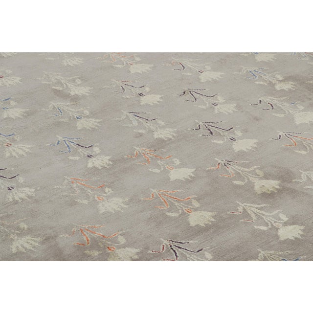 Made with hand-knotted all-natural silk, this 9x12 rug is a bold and exciting new addition to Rug & Kilim’s Modern...