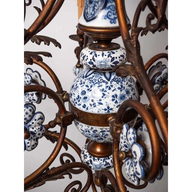 The 19th century delft ten-arm chandelier is a beautiful example of historic craftsmanship and design. It originally...