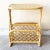 Exceptional vintage boho chair bamboo rattan magazine rack/side table. Features a wonderful sculpted design with a blonde...