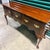 This is a traditional sideboard or hunt board featuring the iconic Queen Anne style, characterized by its elegant, slender...