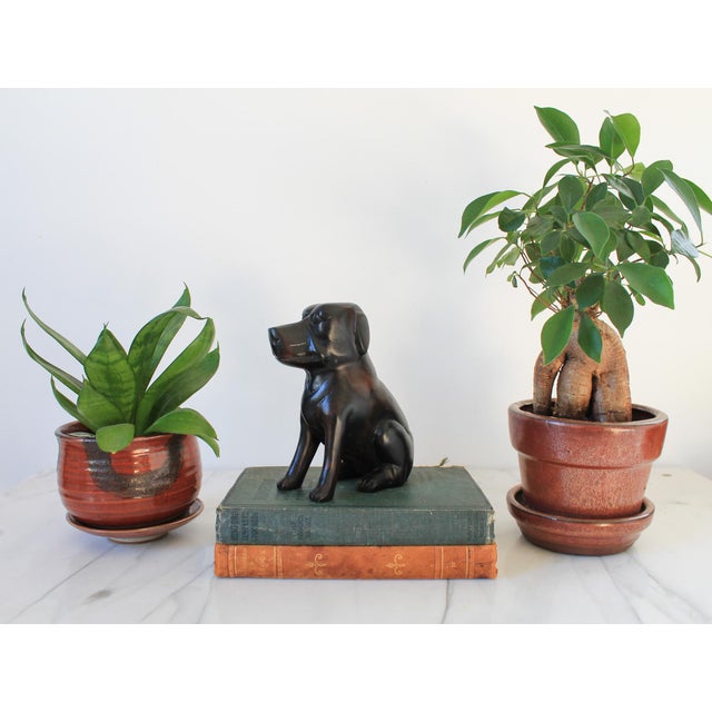 Vintage folk art carved iron wood dog sculpture. Made in the Philippines. Minor age wear.
