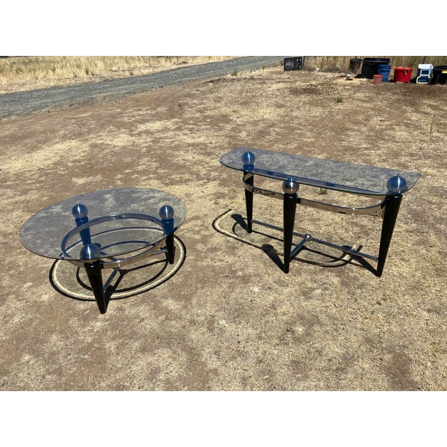 This product is a vintage Space Age Design Chrome and Glass Atomic Coffee & Demilune Console Table. It features a round...