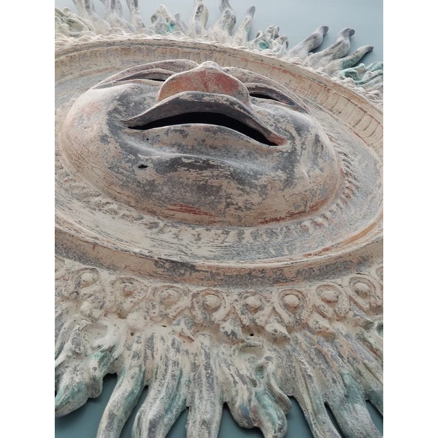 Incredible and unique copper sunburst. Perfect for a protected outdoor space. The piece is bronze with an amazing patina.