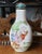 This is a Mid 20th Century Chinese Famille Rose Porcelain Many Sons Motif Snuff Bottle. It measures 3 1/8" tall, 1 1/2"...