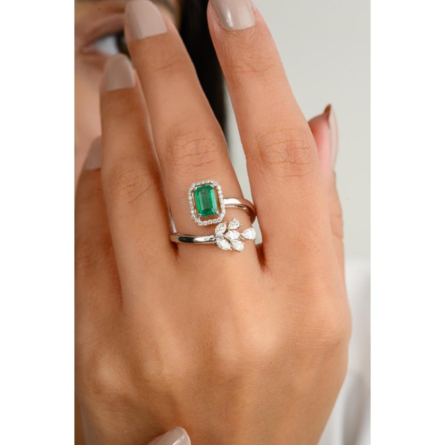 Emerald enhances intellectual capacity of the person. Designed with octagon cut emerald set with diamonds that makes it a...