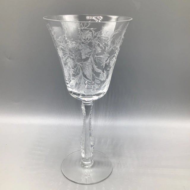Another beautiful etched crystal water goblet by Fostoria. This pattern is called Heather with Fostoria etched on the...