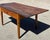 This charming antique farm table captures the soulful simplicity of early American folk design. Hand-crafted from solid...