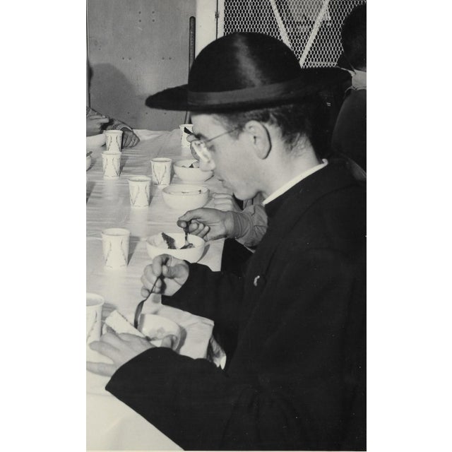 1950s black and white photograph of a group of Scouts and a priest having dessert. Combined shipping available, please...