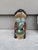 Unusual Majolica frog pitcher wearing a brown jacket signed Fives Lille, circa 1890.