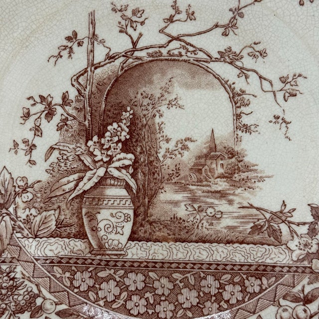 An authentic mid-19th-century English brown transferware plate by Hill Pottery of Staffordshire, featuring the highly...