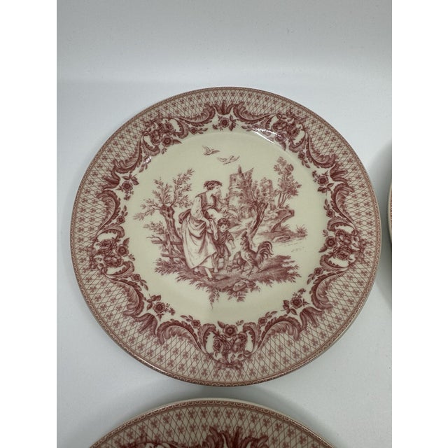 Bring timeless elegance to your table with this **Vintage I. Godinger & Co. "Precious Scenes" Transferware Plates – Set of...