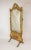 This is an ornamental hand-painted cheval mirror done in the Rococo style. Over time, the original paint has acquired a...