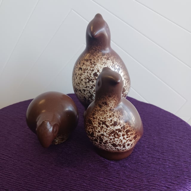 ​A rare and pristine complete family of three vintage stoneware quail by the legendary California studio potter Howard...