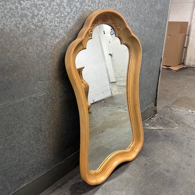 Design Plus Gallery presents a Vintage Wall Mirror from Pulaski Furniture. This traditional mirror showcases a sculptural...