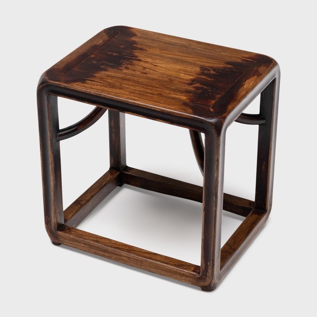 The streamlined form of this low Chinese side table draws from the austere designs of Ming-dynasty furniture. Lightweight...
