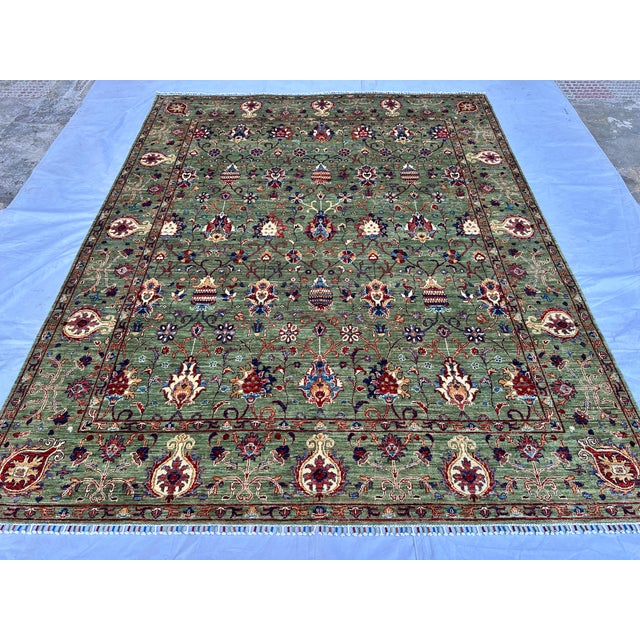 This magnificent hand-knotted wool area rug features a classic Ziegler Chobi all-over design with a Bidjar-style layout....