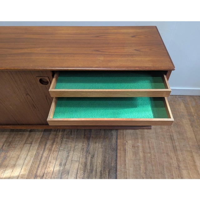 Scandinavian Mid Century Modern Teak Credenza Sideboard by Dyrlund of Denmark. Danish Modern Teak Credenza Sideboard by...