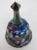 This beautiful Bell is made out of carnival glass, and is in good condition. This bell has a marvelous theme of hand...