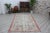 This gorgeous hand knotted Vintage Anatolian area rug is approximately 60 years old in excellent vintage condition. The...