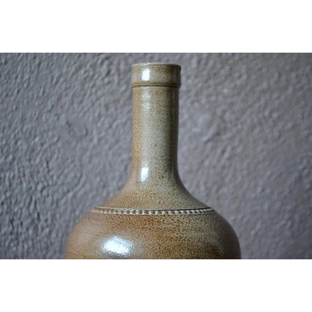 This ceramic is a production of Paul Langeron, potter in Pont De Vernes. In a sober, restrained spirit, the vase takes the...