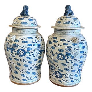 Large Chinoiserie Temple Jars With Foo Dog Designs - A Pair For Sale