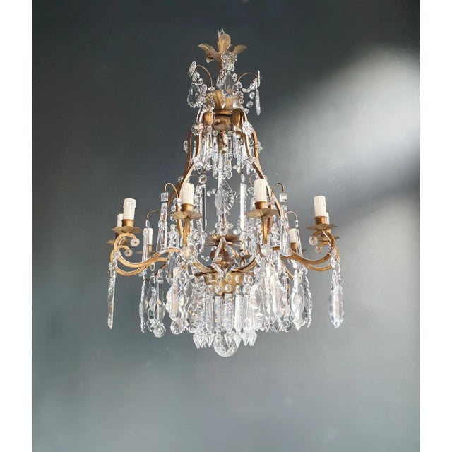 Vintage Chandelier Lovingly Restored in Berlin: Perfectly Adapted for US Electrical Wiring Introducing a captivating...