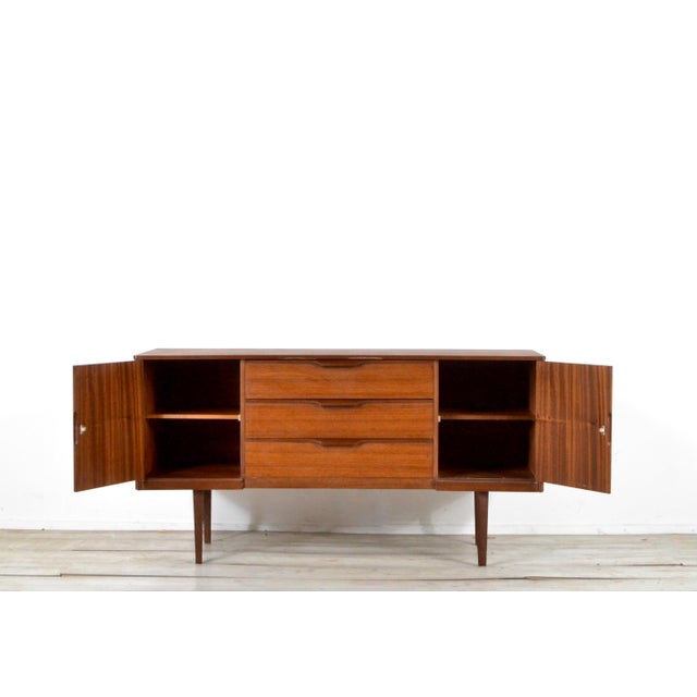 Small Mid-Century Modern Teak Sideboard from Austinsuite, 1960s, in Very Good conditions. Designed 1960 to 1969 This piece...