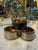 A refined set of three vintage Italian salt cellars crafted in solid brass with elegant black lacquered bands. Each piece...