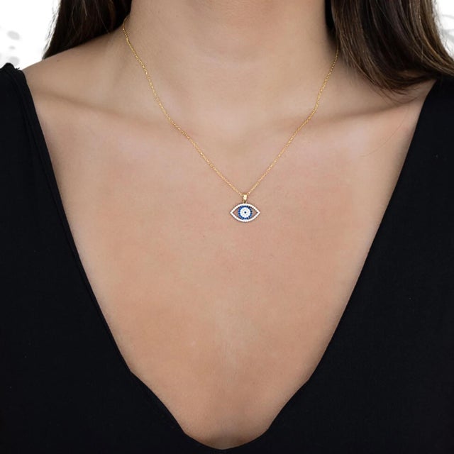 The Sparkly Gaze Evil Eye Gold Chain Necklace is carries a symbolic meaning, making it a perfect choice for those seeking...